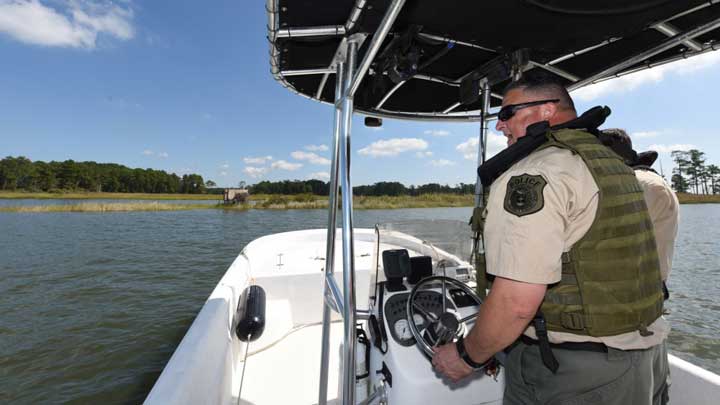 Military bases often allow access to great hunting. Here, U.S. Army Police Officer Sgt. Christopher Griffin, 733rd Security Forces Squadron Game Warden Section conservation law enforcement officer, patrols the waterways along the coast of Joint Base Langley—Eustis in Virginia. (U.S. Air Force image by Senior Airman Delaney Gonzales.)