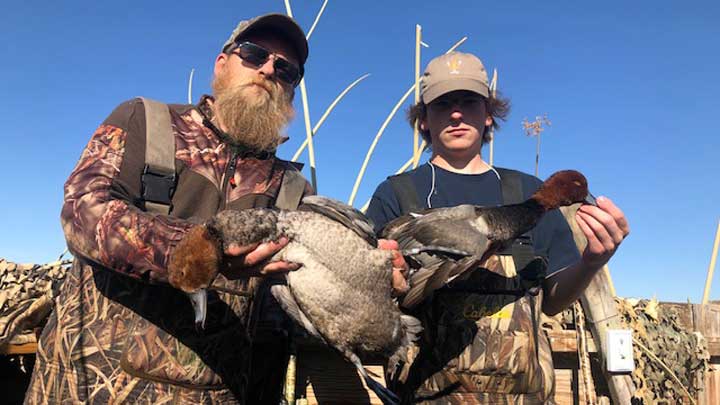 A father and son hunting team harvested two redheads while hunting on Edwards Air Force Base in Kern County in Southern California. (Image courtesy of  John Gorham.)