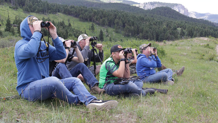 students glassing Montana landscape