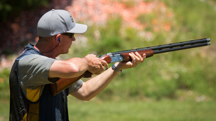 male shooter prepares to fire on the trap range