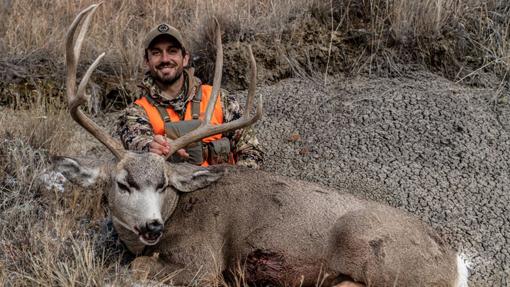 steve soholt poses with a trophy mule deer