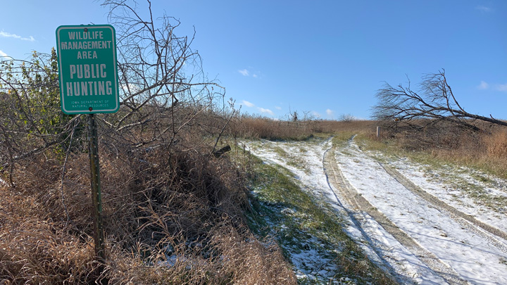 photo of sign displaying public hunting ground