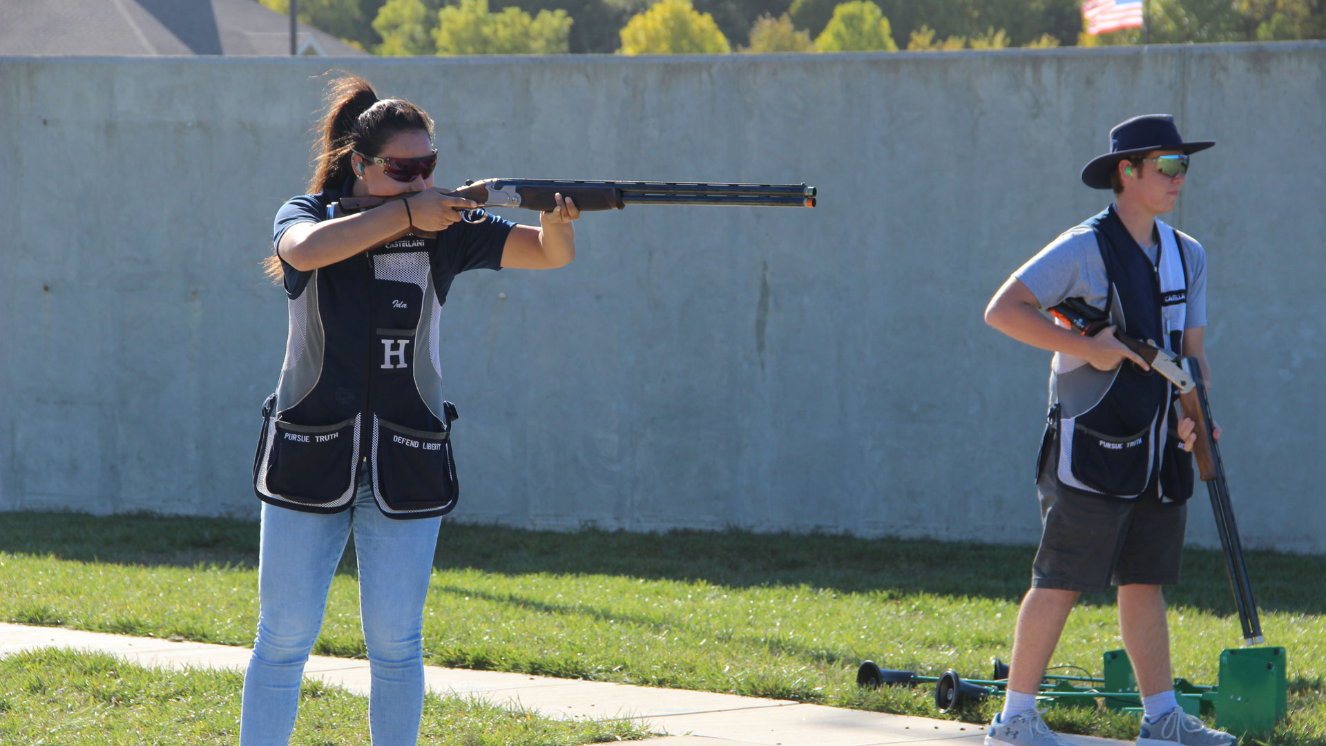 Ida Brown breaks clays at the John Anthony Halter Shooting Sports Education Center.