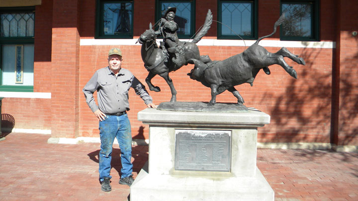 justin young with his sculpture 