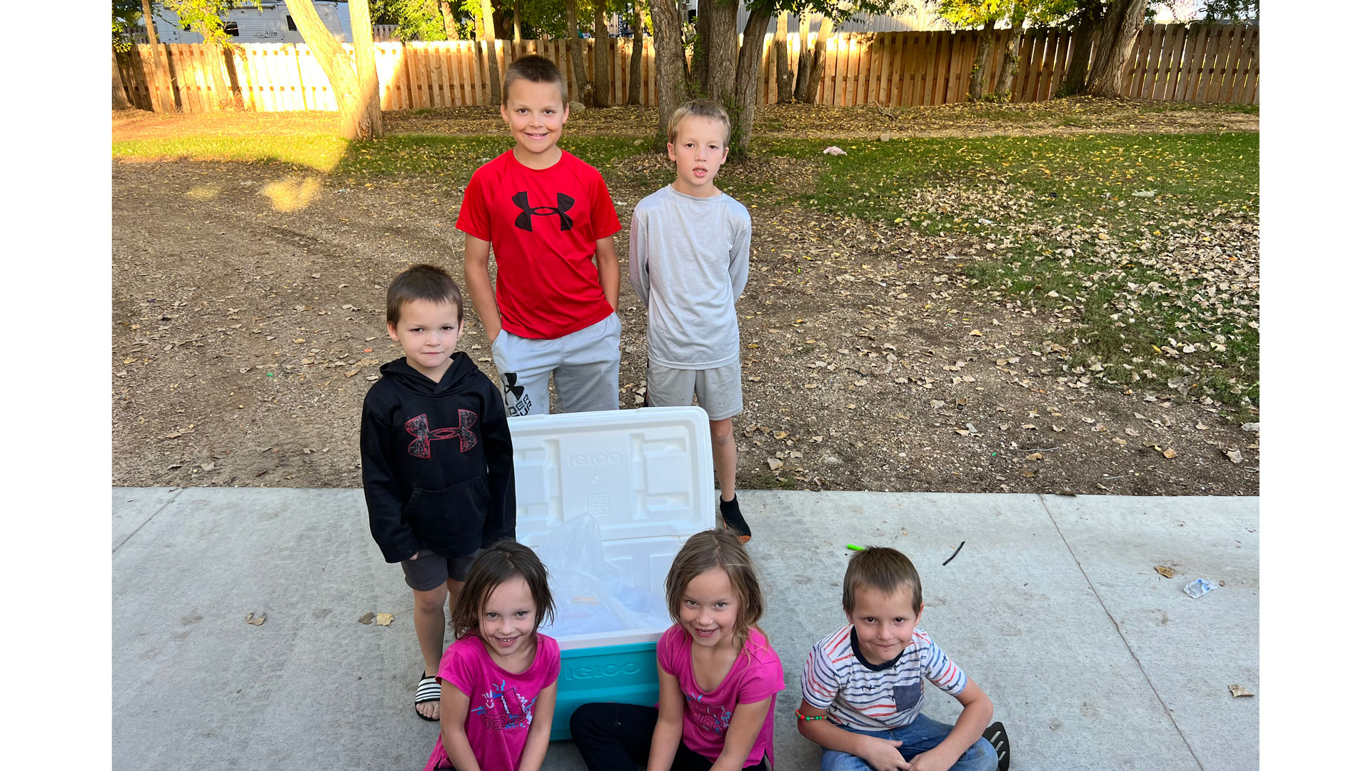 author's children celebrate cooler full of antelope meat