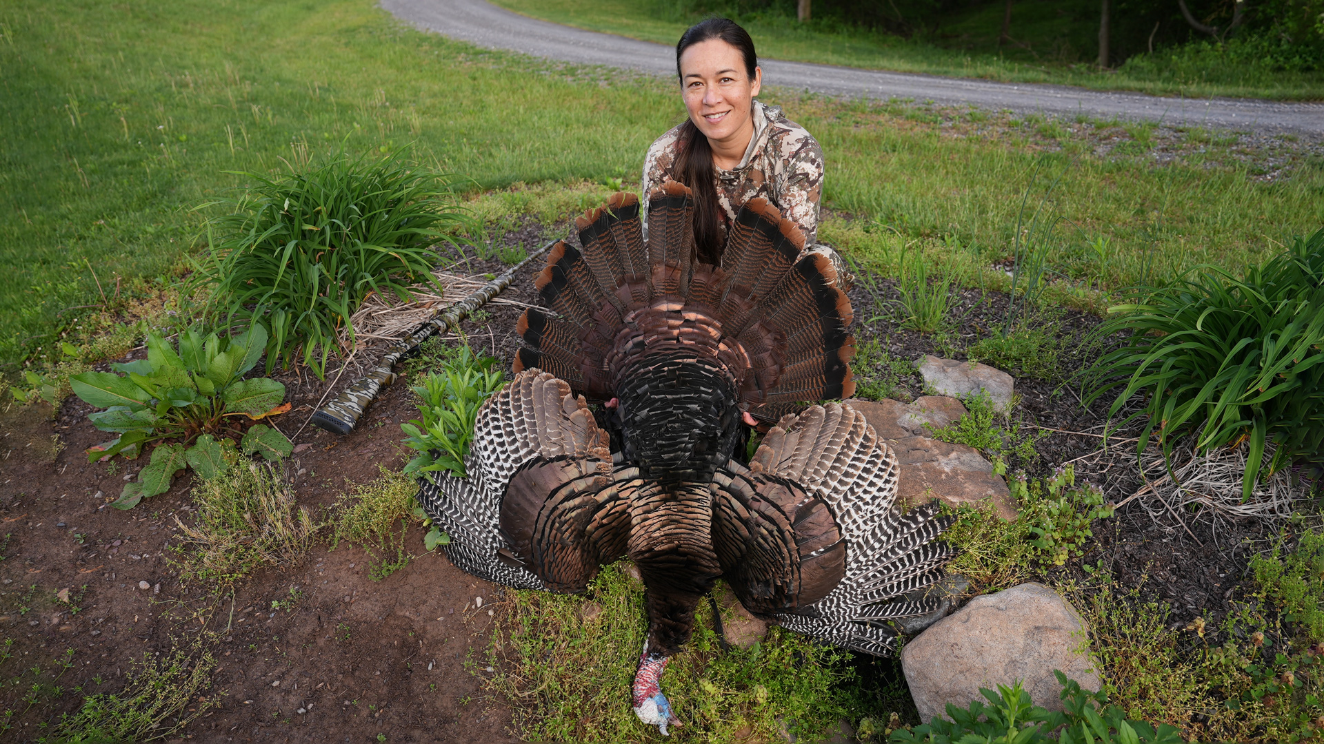 Elizabeth Kligge with a turkey she bagged